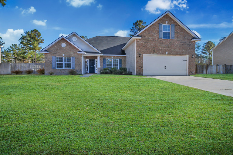 JUST LISTED Mainly One Level, Large 5 Bedroom Home on .79 Acre Lot